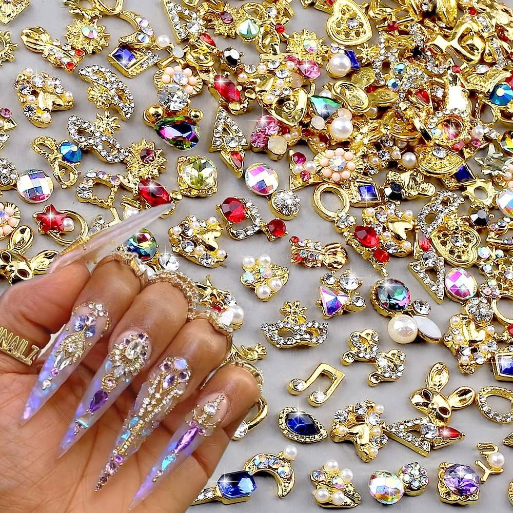 Amazon 50pcs 3D Gold Nail Charms For Acrylic Nails Mix Styles Rhinestones For Nails Metal Nail Jewels For Nail Art Shiny Zircon Nail Rhinestones Alloy Nail Charm Pearl Nail Gems Cute Charms